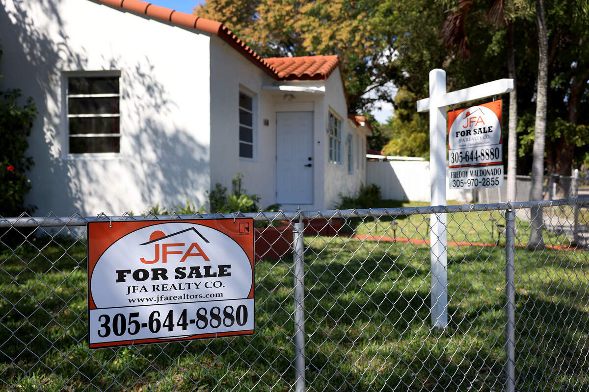 A For Sale sign displayed in front of a Miami home in 2023.