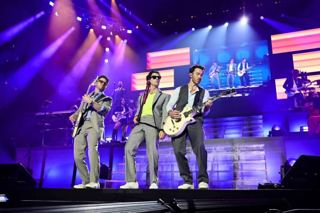 NEW YORK, NEW YORK - AUGUST 20: (L-R) Nick Jonas, Joe Jonas, and Kevin Jonas perform onstage during Jonas Brothers: The Burning Up Tour All Over Again - New York at Madison Square Garden on August 20, 2026 in New York City.