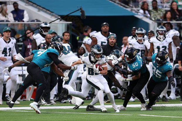 Britain Covey of the Philadelphia Eagles is challenged by Josh Cameron of the Jacksonville Jaguars during the 2026 NFL London Games matchup at Tottenham Hotspur Stadium on Sunday, Oct. 11, 2026, in London. (Ryan Pierse/Getty Images)