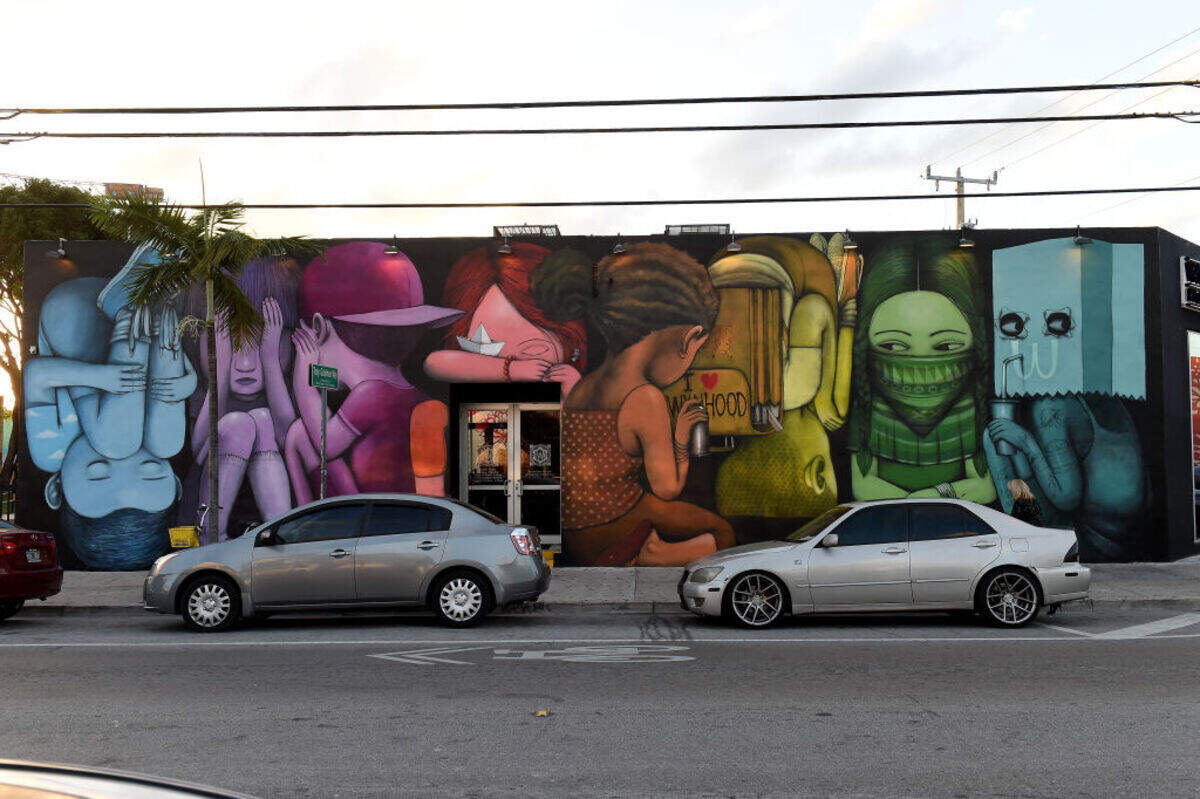 A view of work by artist Seth Globepainter at Wynwood Walls Presents: humanKIND 2017 at Wynwood Walls in 2017.