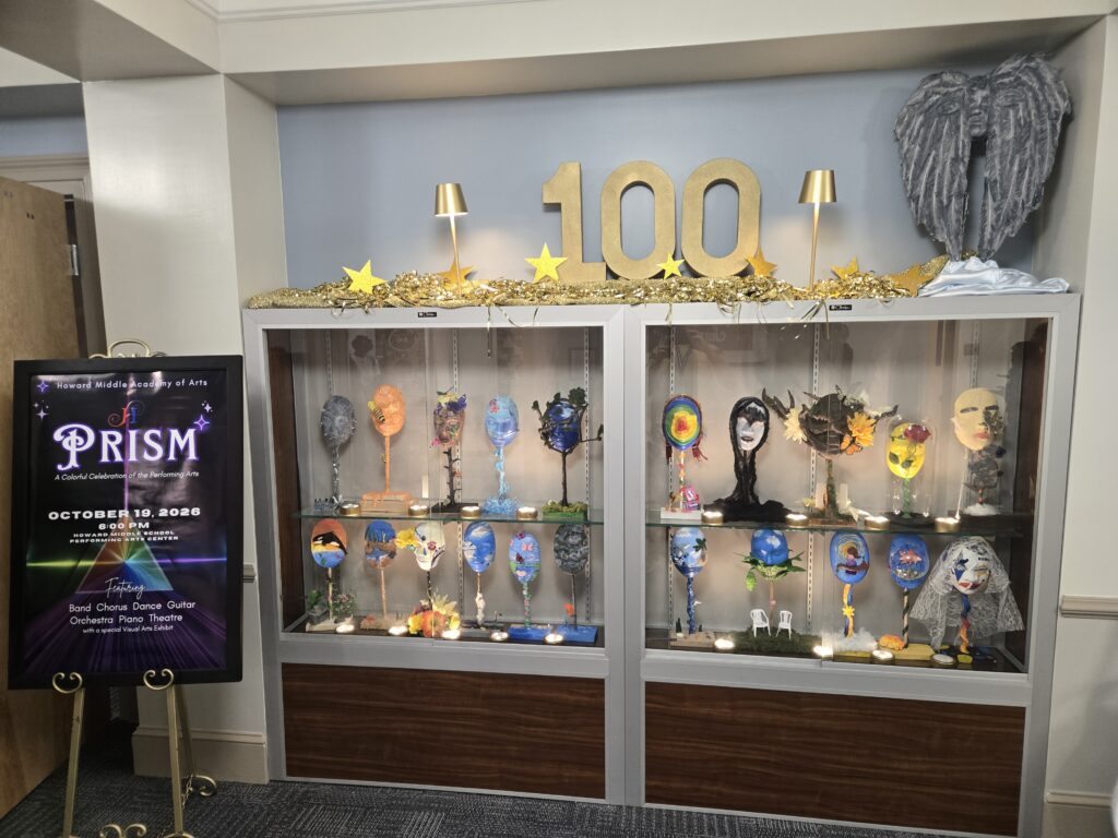 a display case with student art