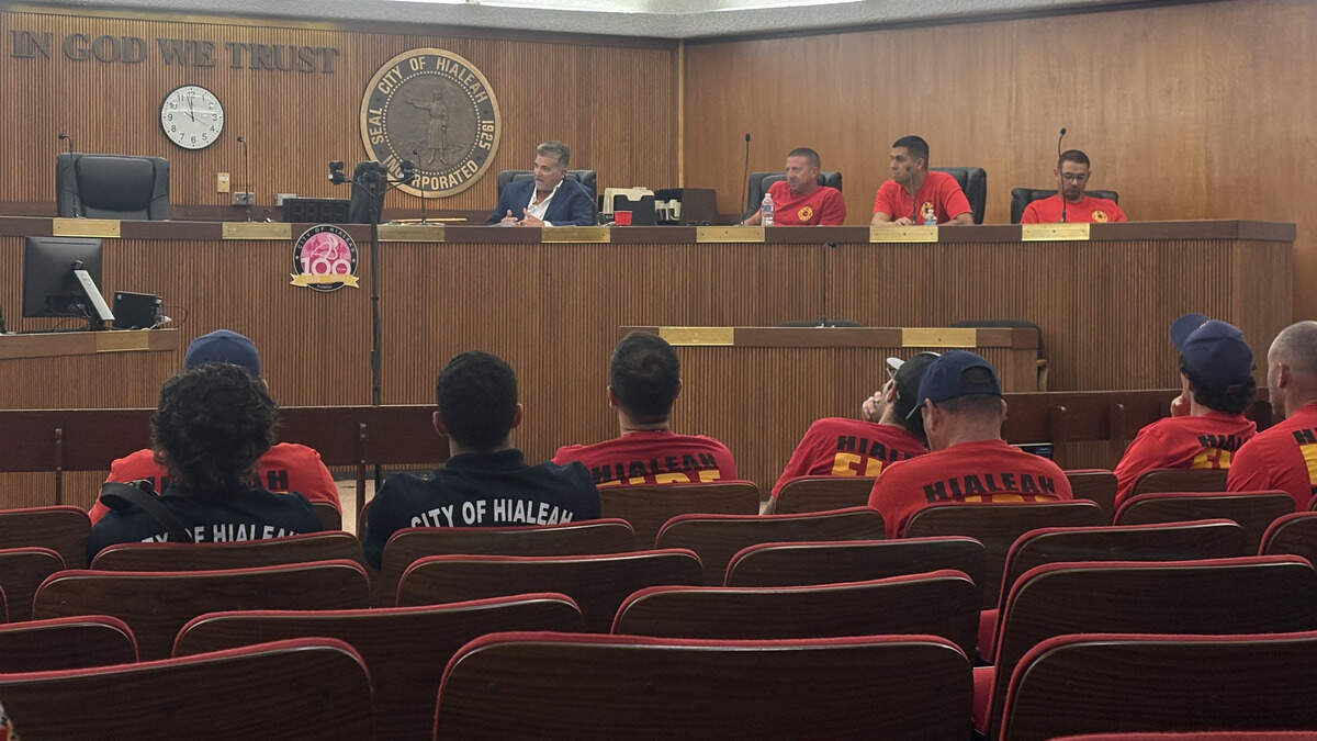 Members of the Hialeah Association of Firefighters Local 1102 meet with city officials during contract negotiations on Sept. 30. From left: Eric Johnson, president; Danny Cruz; union member, Michael Bello, vice president; and Jacques Gazzola, union member. Members of the Hialeah Association of Firefighters Local 1102 meet with city officials during contract negotiations on Sept. 30. From left: Eric Johnson, president; Danny Cruz; union member, Michael Bello, vice president; and Jacques Gazzola, union member.