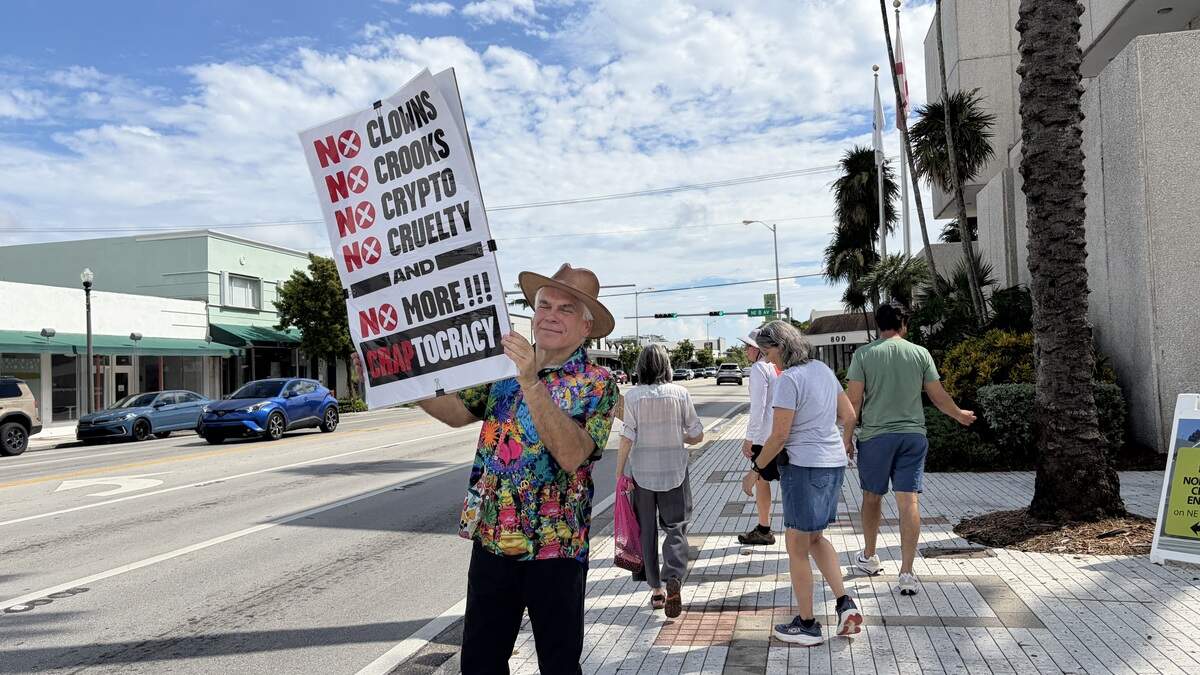 William Prevatel, holds a sign at the North Miami No Kings Day of Action on Oct. 17,2026. William Prevatel, holds a sign at the North Miami No Kings Day of Action on Oct. 17,2026.