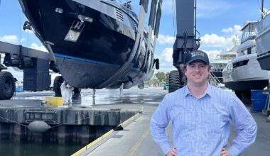 Space Grid AI founder Alex Hilger at a shipyard with a vessel being lifted