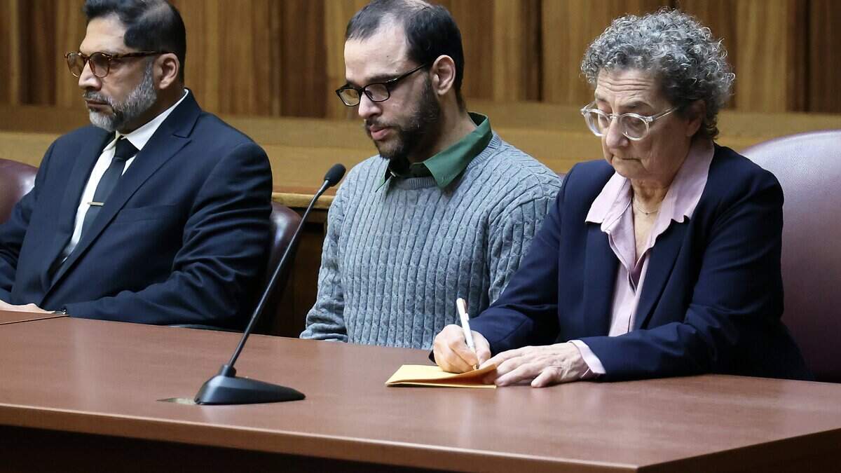 Alberto Sierra sits beside his attorneys Joyce Brenner, right, and Khurrum Wahid, left, as the verdict is read in his death penalty sentencing trial on Tuesday, Oct. 20, 2026. The jury recommended that Sierra be sent to Death Row for murdering his wife and her two young daughters.