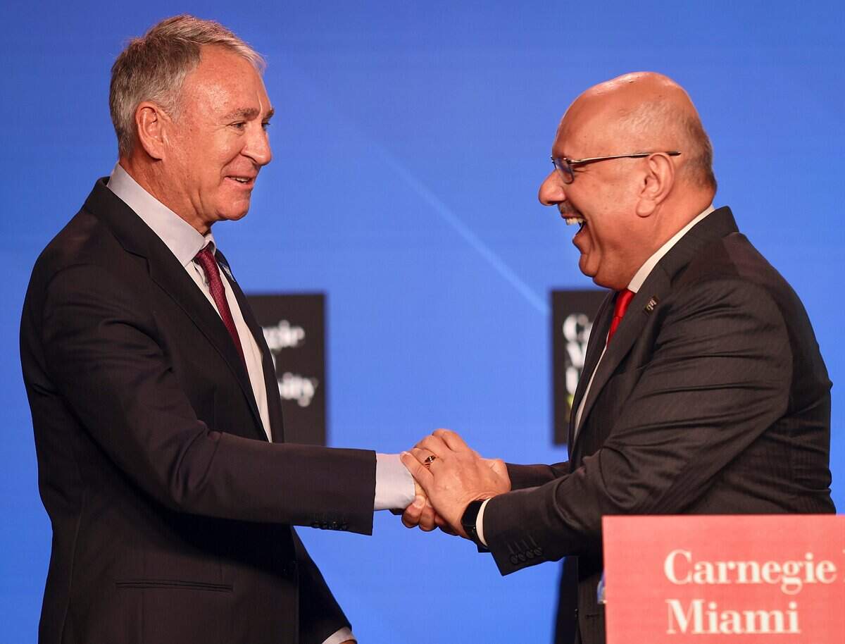 Carnegie Mellon University President Farnam Jahanian, right, greets Ken Griffin, founder and CEO of Citadel, in Wynwood on Thursday, Oct. 1, 2026.