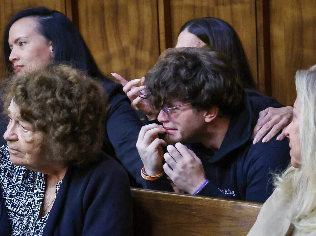 Michael Padrino Jr., the son and brother of the victims, cries as the verdict is read in Alberto Sierra’s death penalty sentencing trial on Tuesday, Oct. 20, 2026. The jury recommended that Sierra be sent to Death Row for murdering his wife and her two young daughters.