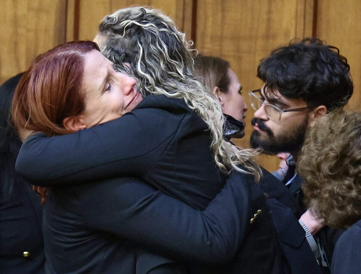 Prosecutor Mary Ernst hugs Channon Castro, one of the victims’ friends, after the verdict is read in Alberto Sierra’s death penalty sentencing trial on Tuesday, Oct. 20, 2026. The jury recommended that Sierra be sent to Death Row for murdering his wife and her two young daughters.