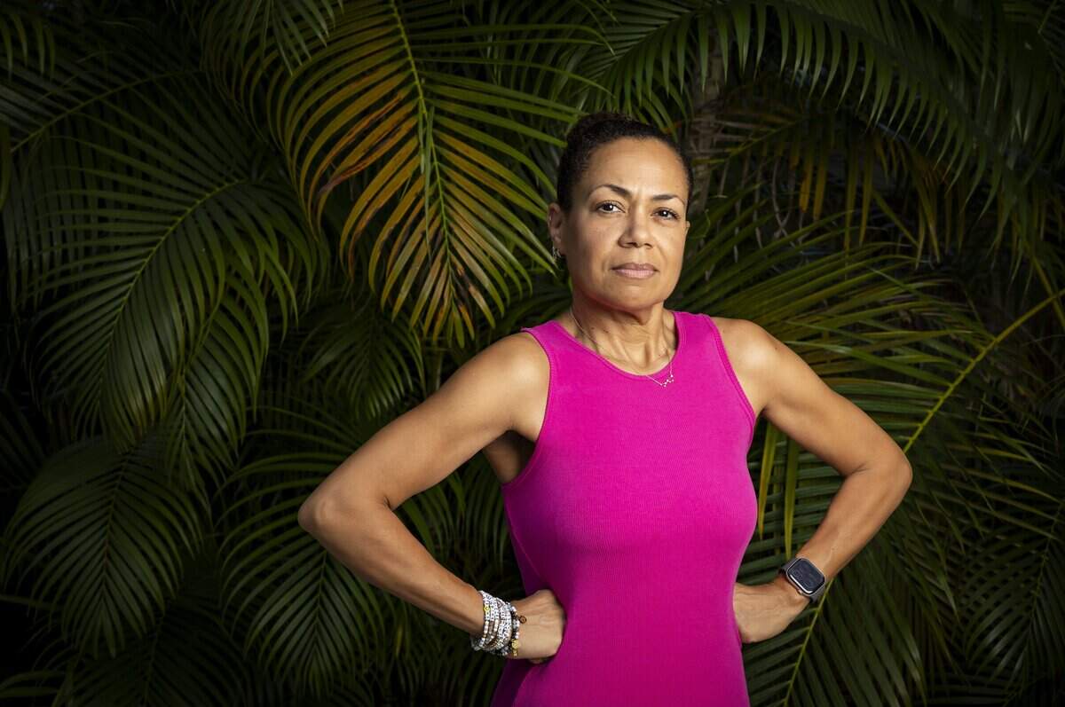 Vianney De Los Angeles, 49, a breast cancer survivor, is photographed at her home on Friday, Oct. 9, 2026, in Miami, Fla. A routine physical two years ago led to an early mammogram and a diagnosis of stage 2 invasive ductal carcinoma.