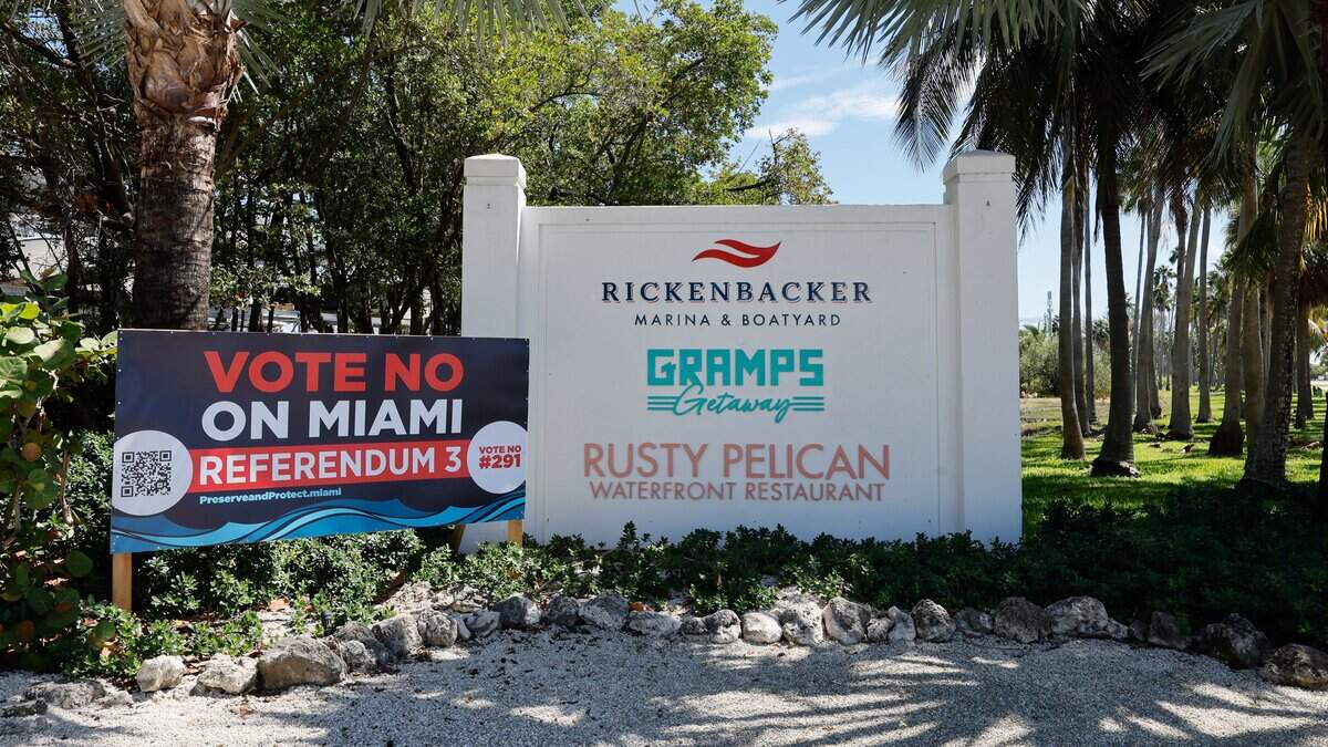 Vote no on Miami referendum 3 poster on display at the Rickenbacker Marina & Boatyard along the Rickenbacker Causeway in Miami, Florida, on Tuesday, October 6, 2026. Miami voters will decide whether to lease about 27.6 acres of publicly owned waterfront on Virginia Key to a private developer for up to 75 years.