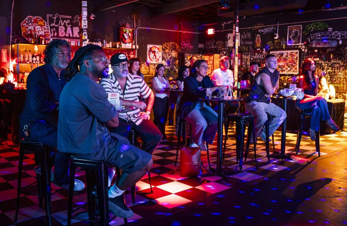 People listen during a panel discussion about issues facing South Florida ahead of the midterm elections in November at Las Rosas on Wednesday, Oct. 7, 2026, in Miami, Fla.