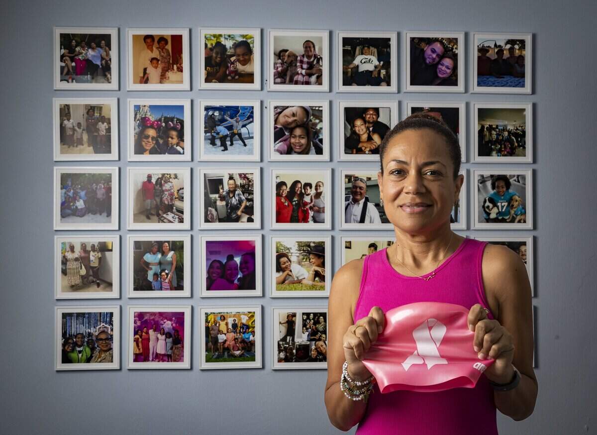 Vianney De Los Angeles, 49, a breast cancer survivor, is photographed at her home on Friday, Oct. 9, 2026, in Miami, Fla. A routine physical two years ago led to an early mammogram and a diagnosis of stage 2 invasive ductal carcinoma.