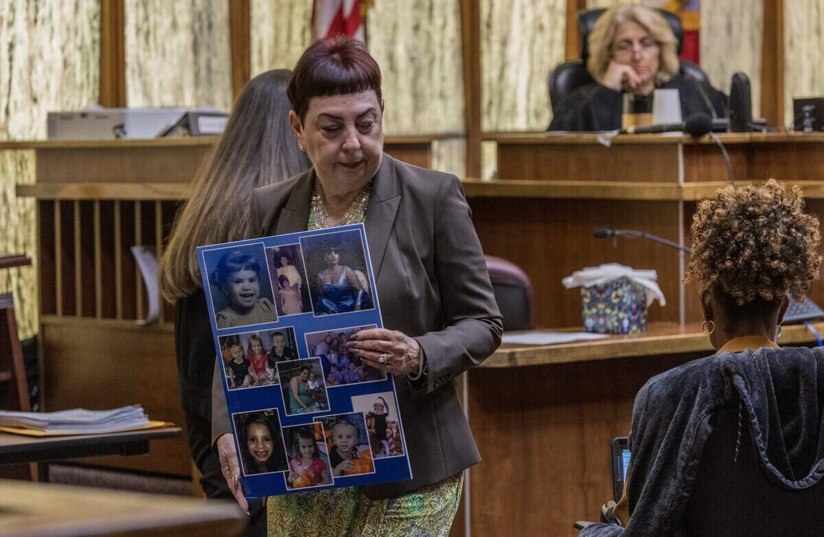 Prosecutor Abbe Rifkin holds a set of family pictures shown to the jury during the sixth day of the sentencing trial of Alberto Sierra in courtroom 4-1, at the Richard E. Gerstein Justice Building, on Tuesday, October 6, 2026. Sierra is facing the death penalty for murdering his wife and her two young daughters.