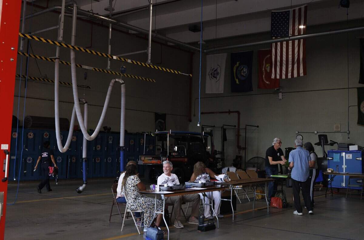 People vote during Primary Election Day in the morning on Tuesday, Aug. 18, 2026, at Indian Creek Fire Station #4 in Miami Beach, Fla.