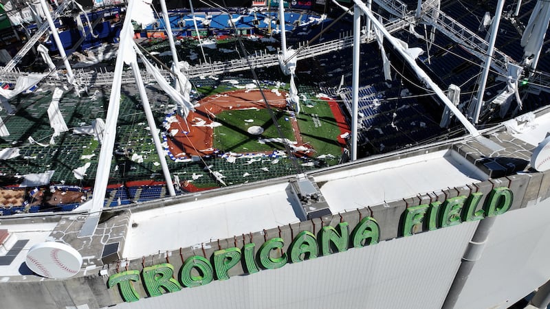 ST PETERSBURG - OCTOBER 10:  In this aerial view, the roof of Tropicana Field is seen in tatters after Hurricane Milton destroyed it as the storm passed through the area on October 10, 2024, in St. Petersburg, Florida. The storm made landfall as a Category 3 hurricane in the Siesta Key area of Florida, causing damage and flooding throughout Central Florida. (Photo by Joe Raedle/Getty Images)