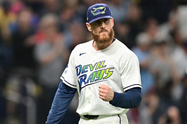 Cam Booser of the Tampa Bay Rays reacts after getting the final out of the seventh inning against the Cleveland Guardians in Monday's Game 6 of the American League Championship Series in St Petersburg, Fla.  (Photo by Julio Aguilar/Getty Images)