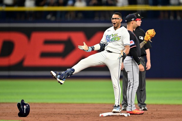 Richie Palacios of the Tampa Bay Rays reacts after hitting a two-RBI double during the second inning against the Cleveland Guardians in Monday's Game 6 of the American League Championship Series in St Petersburg, Fla.  (Photo by Julio Aguilar/Getty Images)
