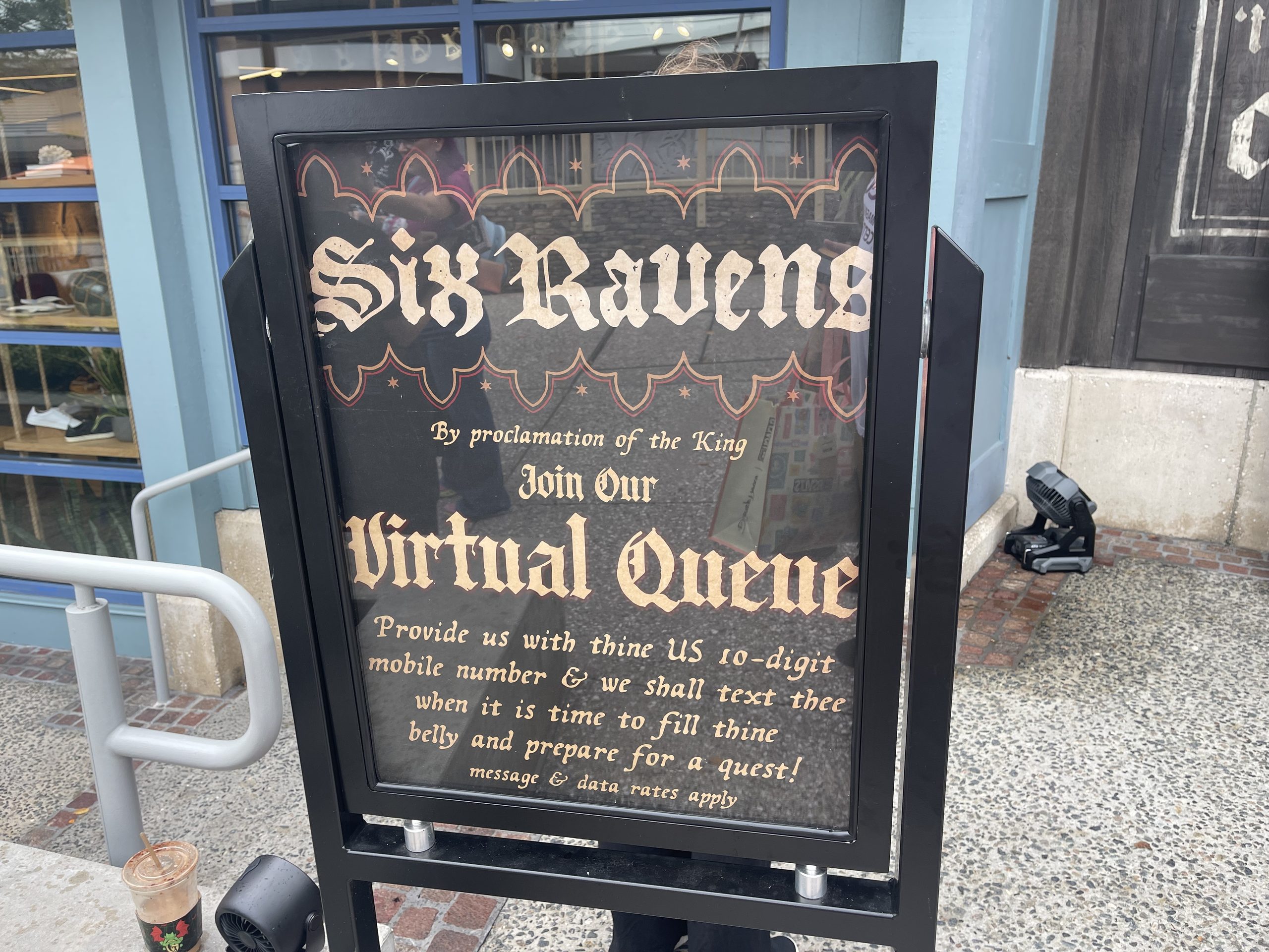 Six Ravens grand opening virtual queue sign