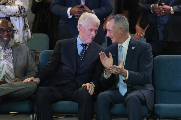 Former U.S. President Bill Clinton speaks with Florida Democratic gubernatorial candidate David Jolly as he campaigns with him at the Koinonia Worship Center on October 20, 2026 in Hollywood, Florida. Jolly is running against Republican gubernatorial candidate Rep. Byron Donalds (R-FL) for the Florida governorship in the November 3rd election. (Photo by Joe Raedle/Getty Images)