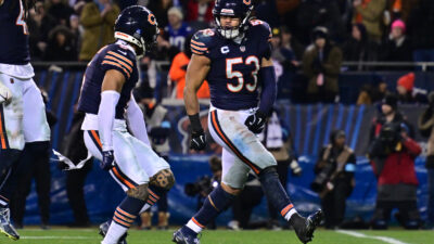 Dec 26, 2024; Chicago, Illinois, USA; Chicago Bears linebacker T.J. Edwards (53) and cornerback Kyler Gordon (6) celebrate a defensive stop against the Seattle Seahawks during the fourth quarter at Soldier Field.