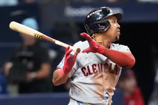 Jose Ramirez watches his RBI single against the Rays during the ninth inning in Game 1 of the American League Championship Series in St. Petersburg, Fla. on Oct. 12. (David J. Phillip/The Associated Press)
