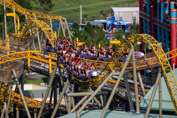 Theme park guests enjoy a ride on Stardust Racers within Celestial Park at Universal Epic Universe on Aug. 27, 2025. The park celebrates its 100th day open on Aug. 30. (Patrick Connolly/Orlando Sentinel)