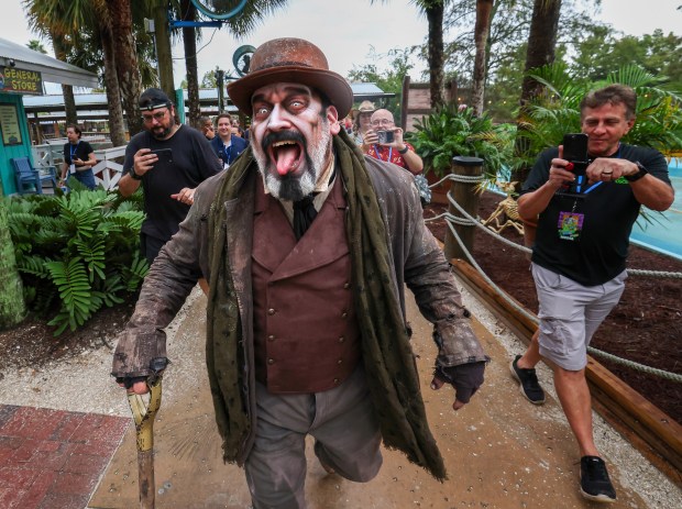 Cyrus The Gravedigger, one of the spooky creatures at Gatorland's 8th annual Gators, Ghosts and Goblins event, welcomes guests Thursday, October 8, 2026. The family-friendly, daytime Halloween celebration takes place weekends through October 25. (Joe Burbank/Orlando Sentinel)