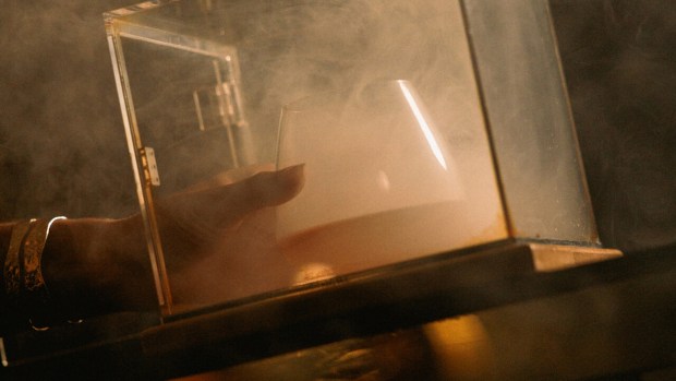 Smoked cocktails are extra ethereal at Epilogue: The Haunted Library, a Halloween speakeasy at the Four Seasons Orlando. (Photo courtesy Four Seasons Orlando)