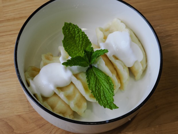 The dessert pierogi at Pierogi One are boiled and come with fruit or vanilla-cheese filling. If they were pan-crisped, they'd give me 100 percent blintz vibes. Tasty, though! (Courtesy Lisa Wilk/TasteCookSip.com)