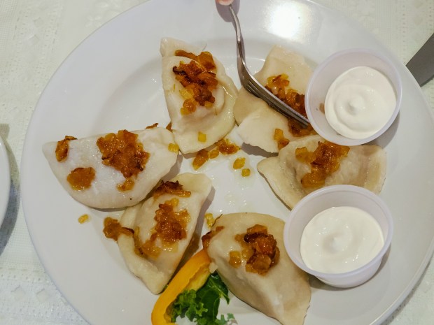 The O.G. Boiled pierogi from Anna's Polish in Winter Park. You can get them pan-fried here, too. Topped with beautifully caramelized onions and a side of sour cream, they were serving 'em by the platefull on a recent Sunday evening visit, where multigenerational diners, many speaking Polish, enjoyed a relaxed meal. (Lisa Wilk/TasteCookSip.com)