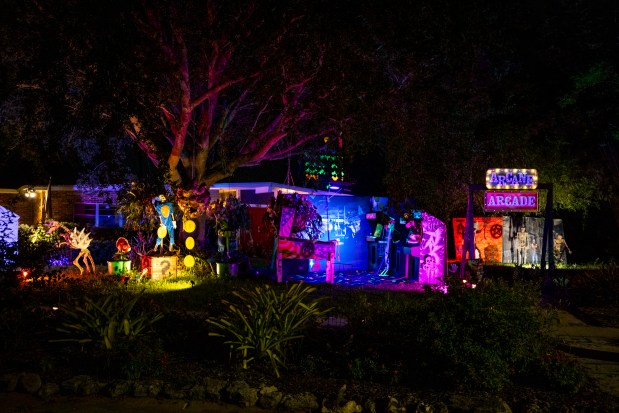 The "Arcane Arcade" is the theme for this year's display that took over the front lawn of Becky Schaff and Jason Jakubowski at 1401 Henry Balch Drive in Orlando on Oct. 12, 2026. (Patrick Connolly/Orlando Sentinel)