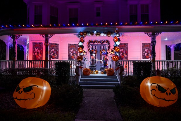 The home at 1100 Celebration Ave. in Celebration features Mickey and Minnie dressed as Jack Skellington and Sally on Oct. 10, 2026. (Patrick Connolly/Orlando Sentinel)