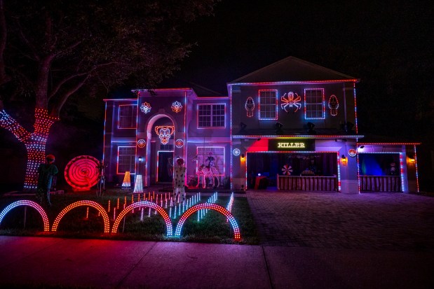 "Carn-Evil" is the theme for Eric Corriea's synchronized light show at 5155 Cape Hatteras Drive in Clermont on Oct. 18, 2026. (Patrick Connolly/Orlando Sentinel)
