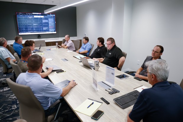 Engineers with LJA Engineering meet to discuss a project at the engineering consulting firm's Maitland office on Monday, September 21, 2026. (Rich Pope/Orlando Sentinel)
