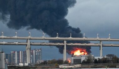 Smoke rose above the city following an air attack on the oil terminal in Saint Petersburg Oct. 18, 2026, amid the ongoing Russian-Ukrainian conflict. Russia shot down dozens of Ukrainian drones near Saint Petersburg, authorities said, with an oil terminal hit and flights disrupted at one of the country's busiest airports.