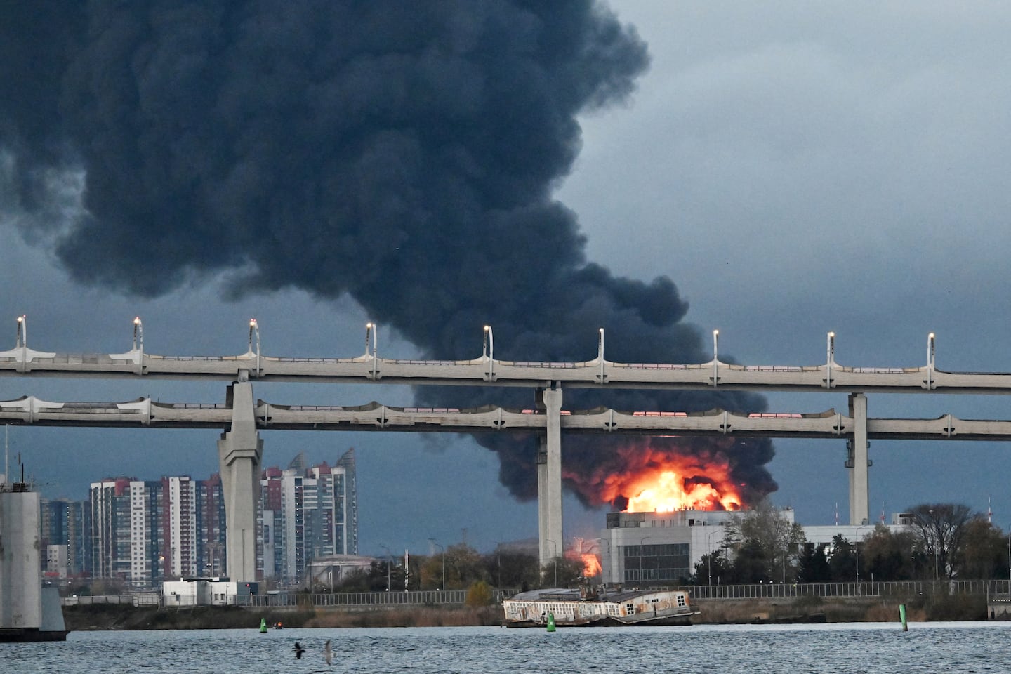 Smoke rose above the city following an air attack on the oil terminal in Saint Petersburg Oct. 18, 2026, amid the ongoing Russian-Ukrainian conflict. Russia shot down dozens of Ukrainian drones near Saint Petersburg, authorities said, with an oil terminal hit and flights disrupted at one of the country's busiest airports.