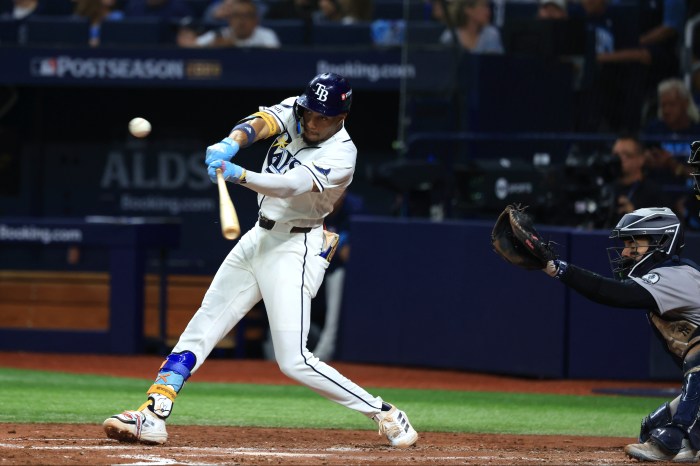 Chandler Simpson takes a swing at the plate.
