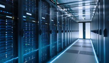 A row of server racks inside a modern data center