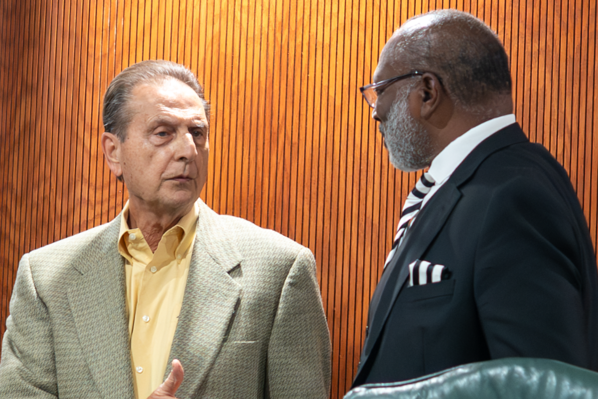 John Drago (left), Orange County's appointed representative on the Apopka Community Redevelopment Agency Board, speaks with then-City Commissioner Alexander H. Smith during a Jan. 21 CRA meeting. The city is accepting applications for vacancies on the CRA Board and Planning Commission through Nov. 6. 