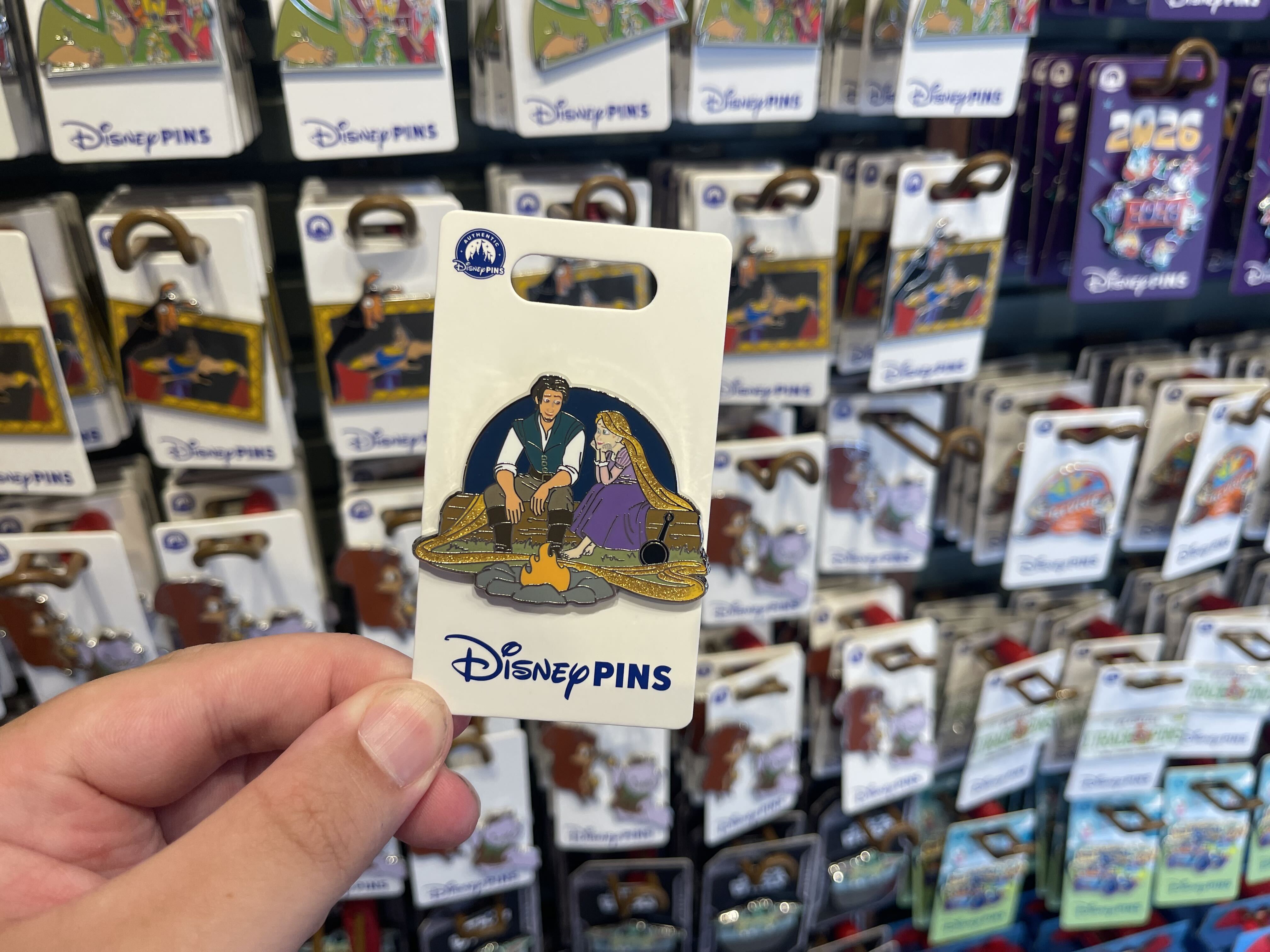 Five new open edition pins feature familiar Disney favorites, from Goofy’s signature “Gawrsh!” to Rapunzel and Flynn Rider's tender moment at a campfire.