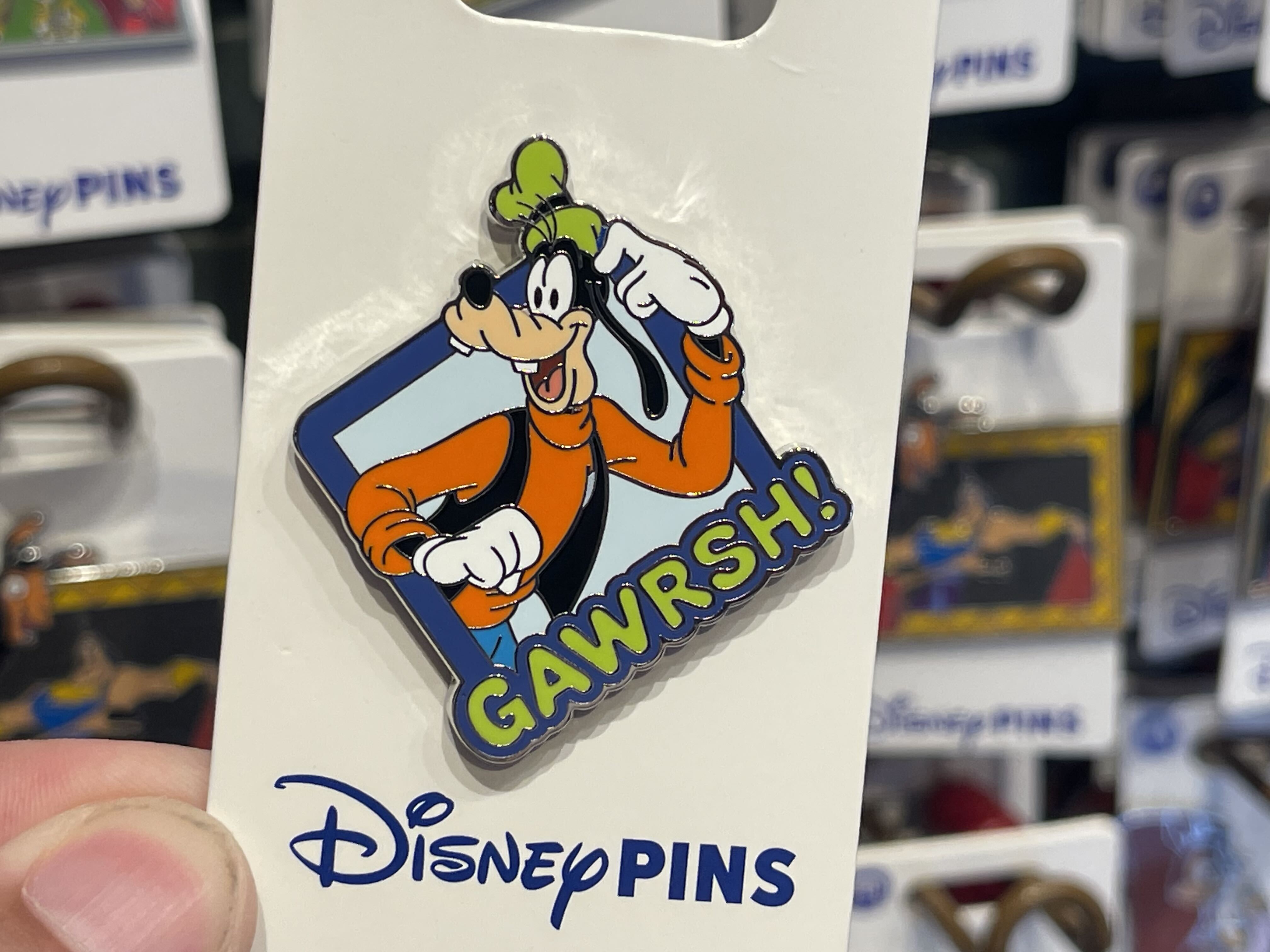 Five new open edition pins feature familiar Disney characters, from Goofy’s signature “Gawrsh!” to Rapunzel and Flynn Rider sharing a moment beside a campfire.