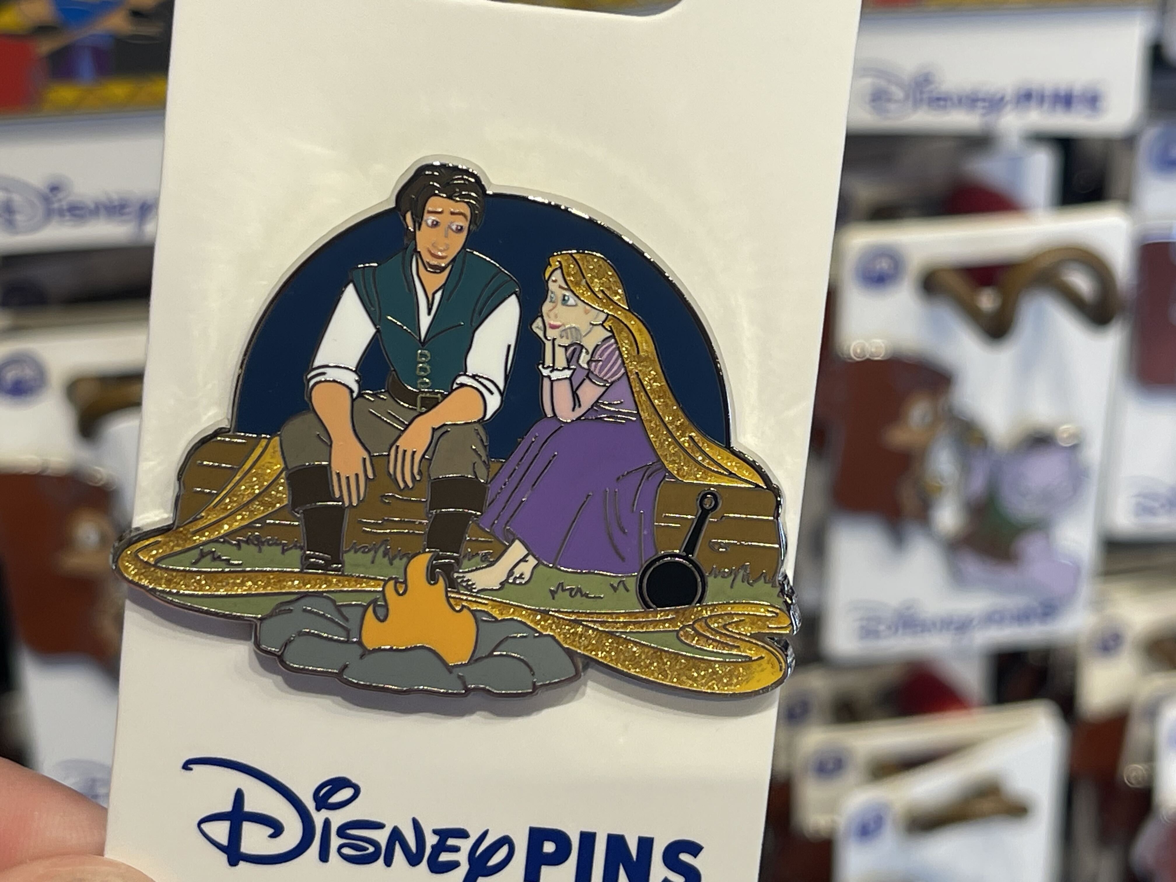 Five new open edition pins feature familiar Disney favorites, from Goofy’s signature “Gawrsh!” to Rapunzel and Flynn Rider's tender moment at a campfire.