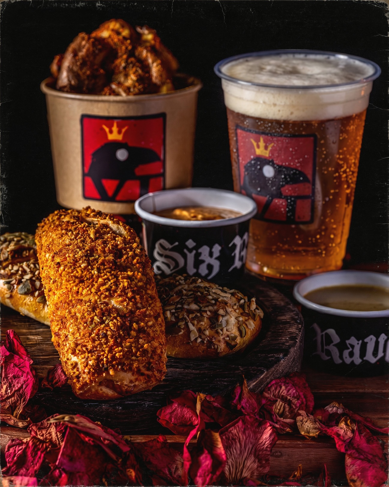 Six Ravens is celebrating its grand opening today, October 17, with a collectible shield pin available free with purchase while supplies last.