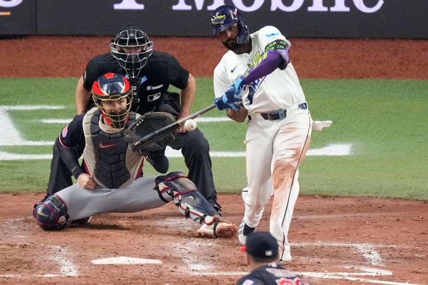 Tampa Bay Rays' Junior Caminero hits his two-run home run that helped send the Rays to the World Series.