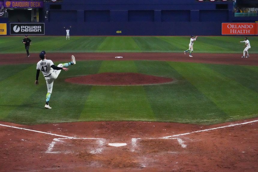 Tampa Bay Rays pitcher Bryan Baker celebrates their win against the Cleveland Guardians that sent them to the World Series.