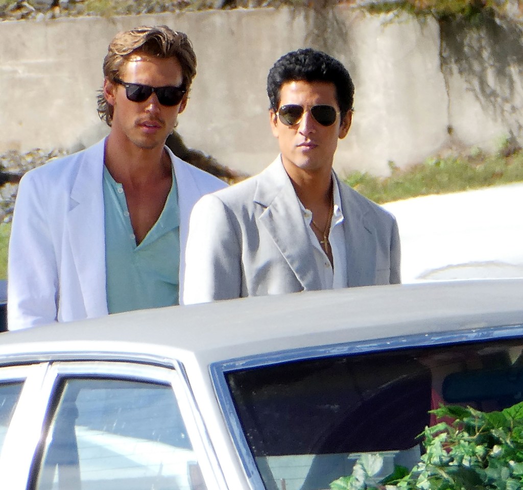 Austin Butler and Danny Ramirez on the set of "Miami Vice 85".