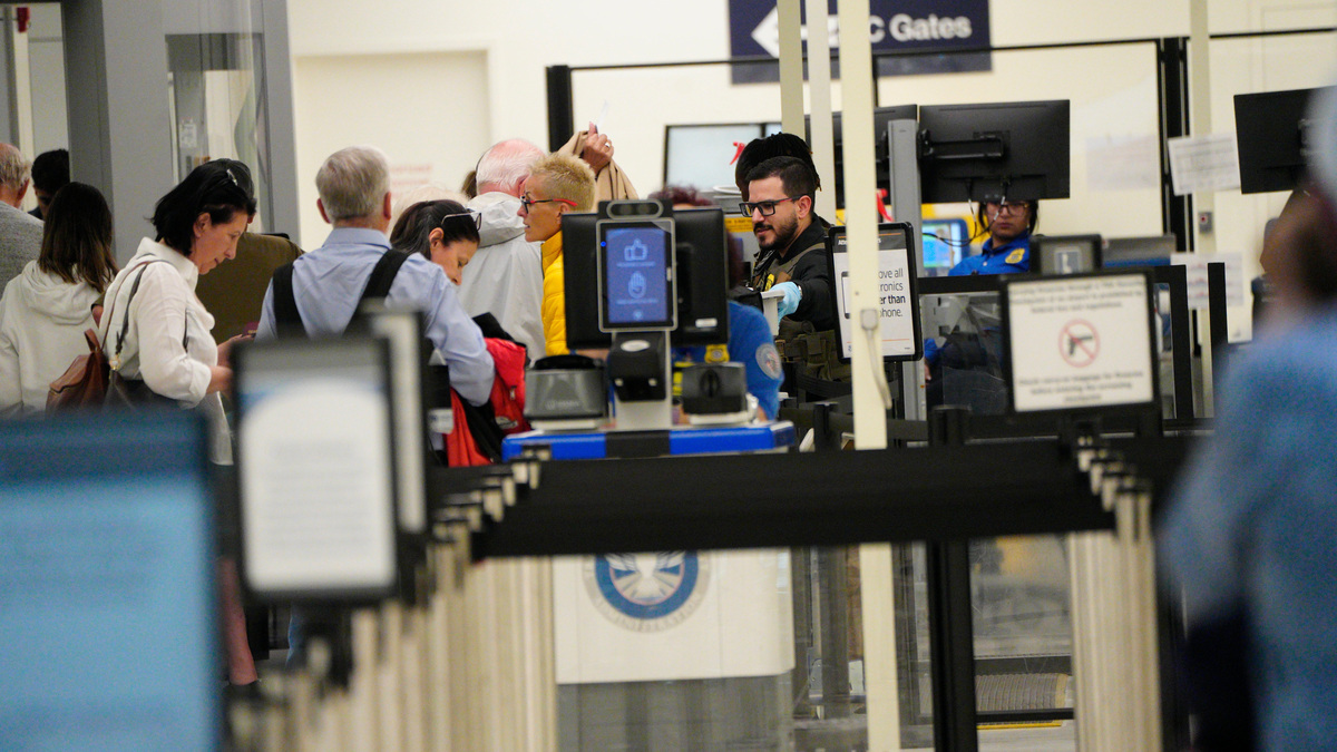 Scenes from Southwest Florida International Airport on Wednesday, March 25, 2025 as members of U.S. Immigration and Customs Enforcement (ICE) work at Southwest Florida International Airport. They were not seen working any screening equipment. They are at RSW assisting TSA due to staffing shortages during a government shutdown.