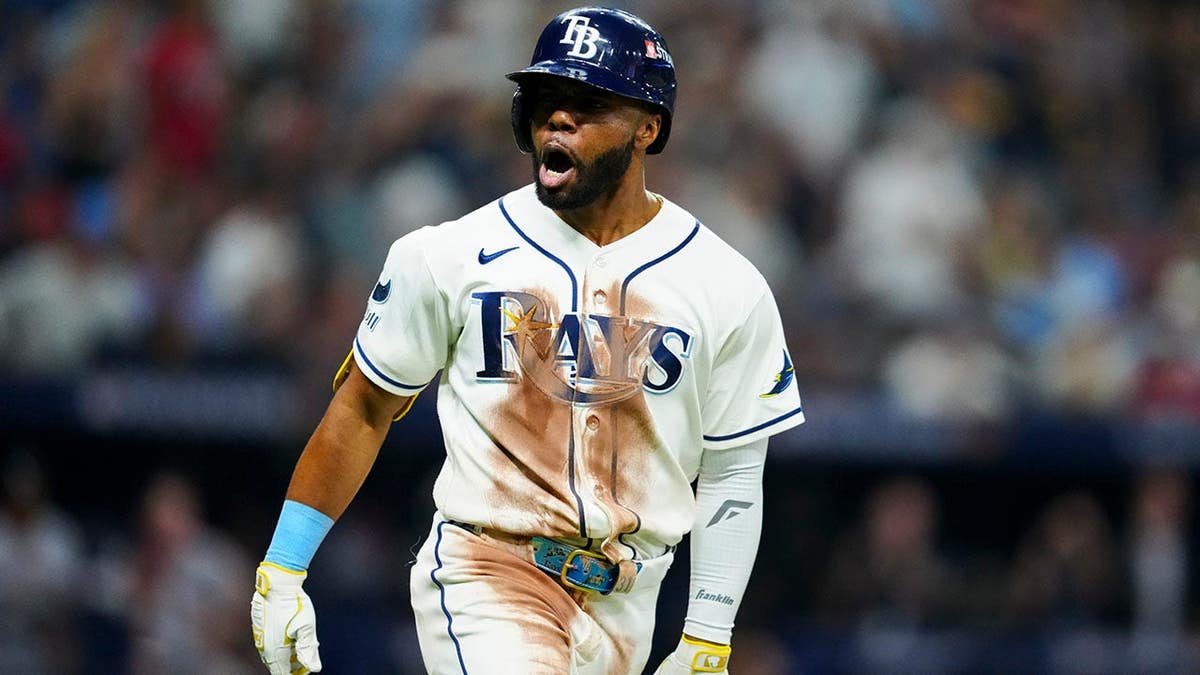 Cedric Mullins rounds the bases after hitting a home run at Tropicana Field.