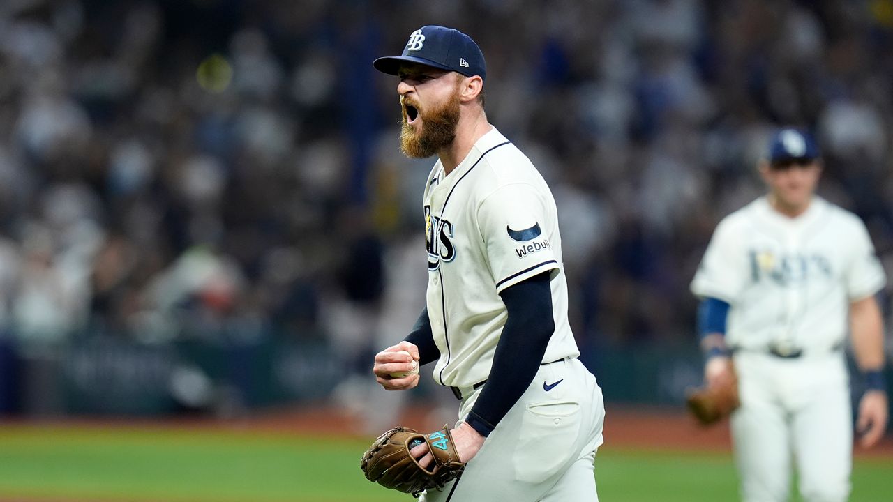 Tampa Bay Rays pitcher Bryan Baker celebrates after closing out the New York Yankees in the ninth inning of the Rays' 1-0 win in Game 1 of an American League Division Series baseball game Saturday, Oct. 3, 2026, in St. Petersburg, Fla. (AP Photo/Chris O'Meara)