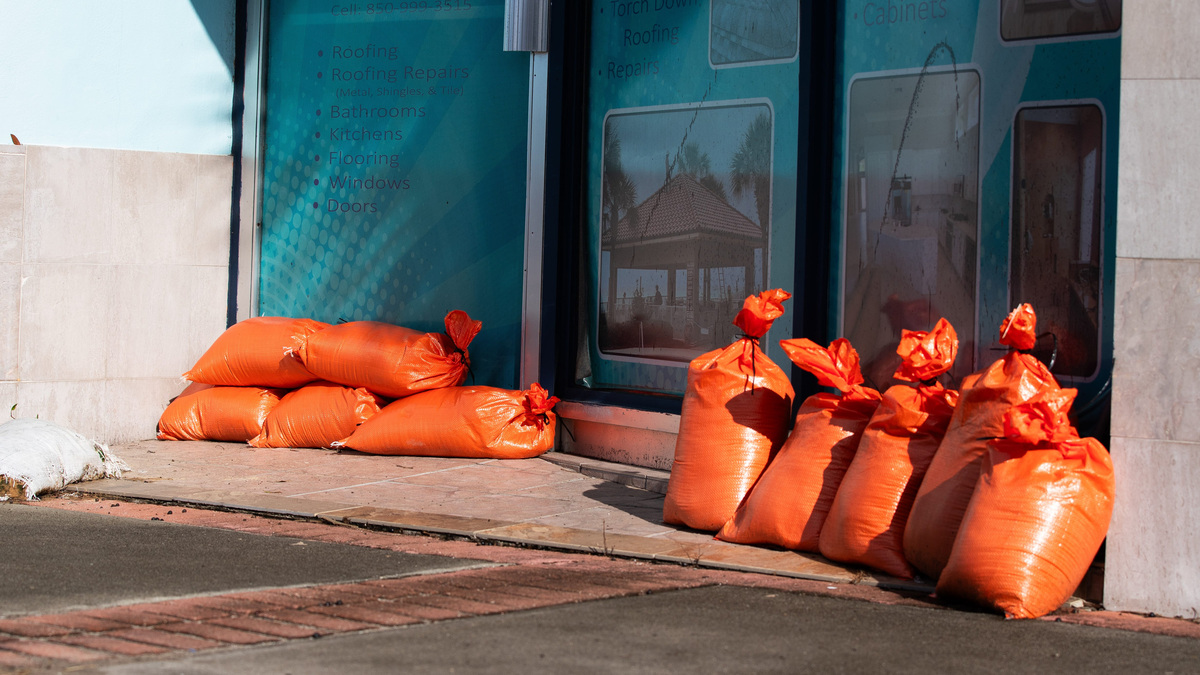 Sandbags line the front of a downtown Carrabelle, Florida business on Saturday, Oct. 10, 2026. Sandbags line the front of a downtown Carrabelle, Florida business on Saturday, Oct. 10, 2026.